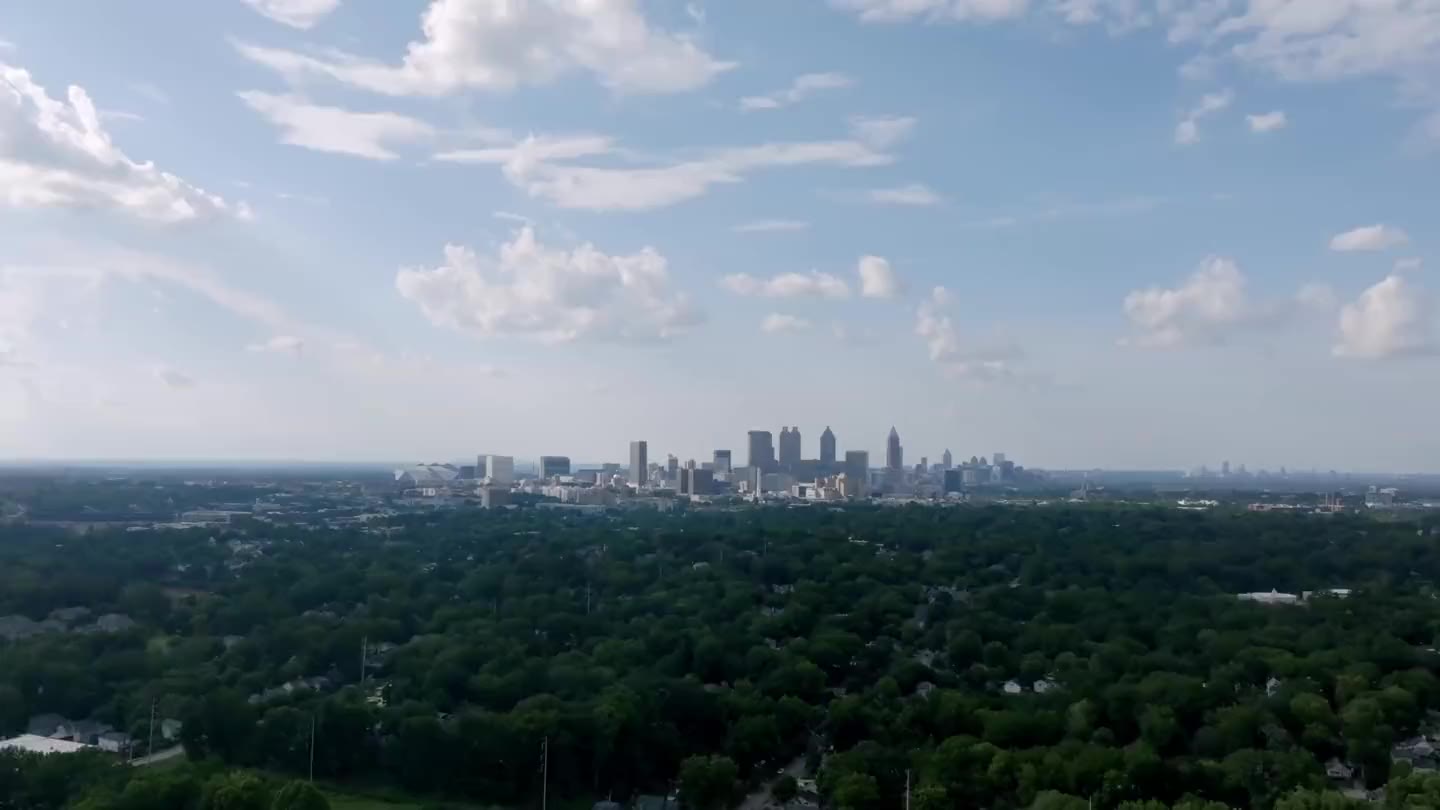 Aerial view of the Atlanta skyline above the North Atlanta tree canopy